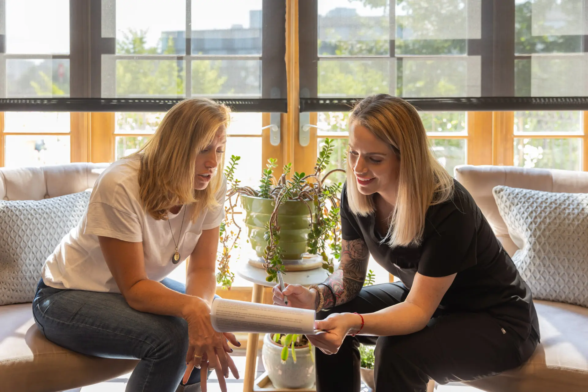 Practitioner and patient discussing a treatment plan